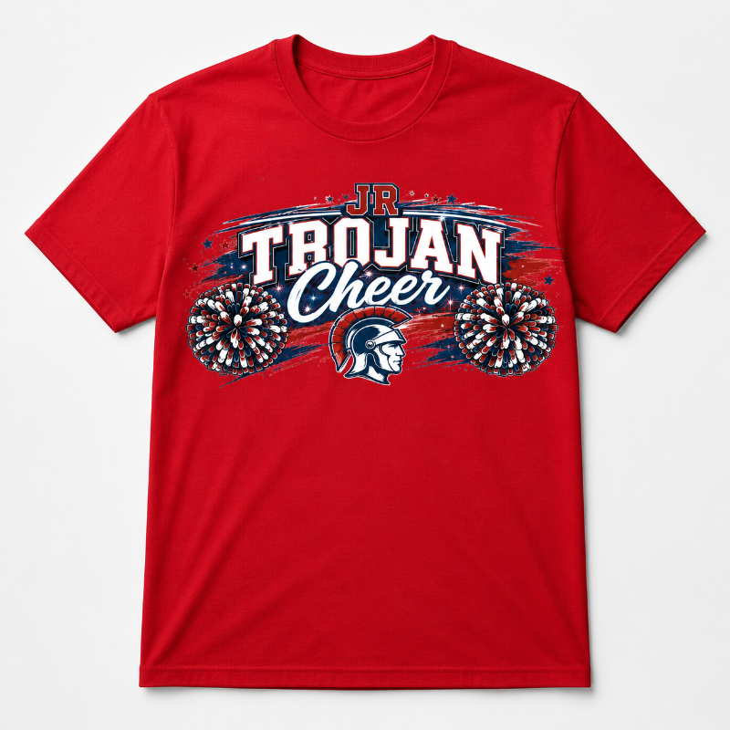 A red short-sleeve crewneck t-shirt featuring a 'Junior Trojan Cheer' graphic on the chest with a Spartan helmet, fireworks, and pom-poms, shown on a light gray background.