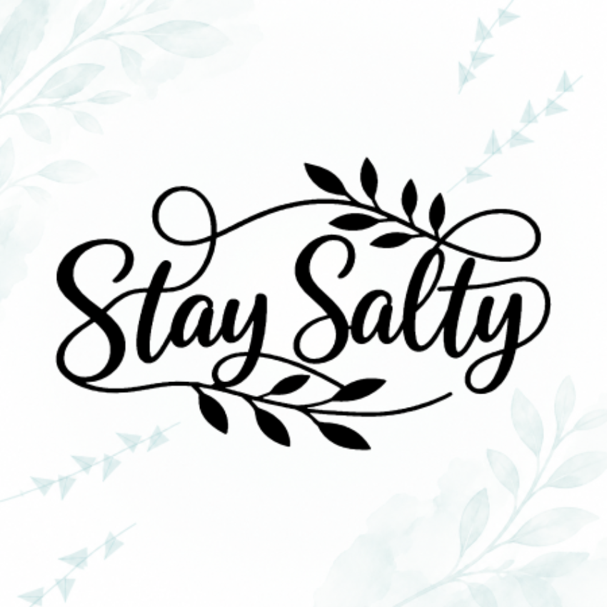 Black cursive typography reading 'Stay Salty' with decorative leaf flourishes, centered on a white background with faint pale blue botanical watercolor accents in the corners.