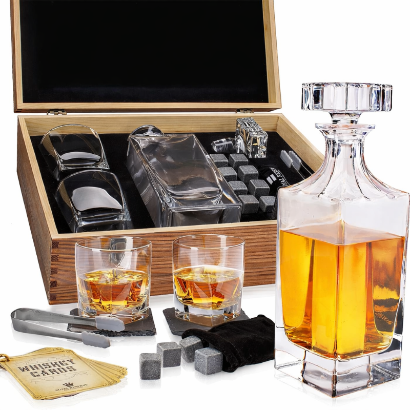 Whiskey set with decanter, glasses, and accessories in a wooden box.